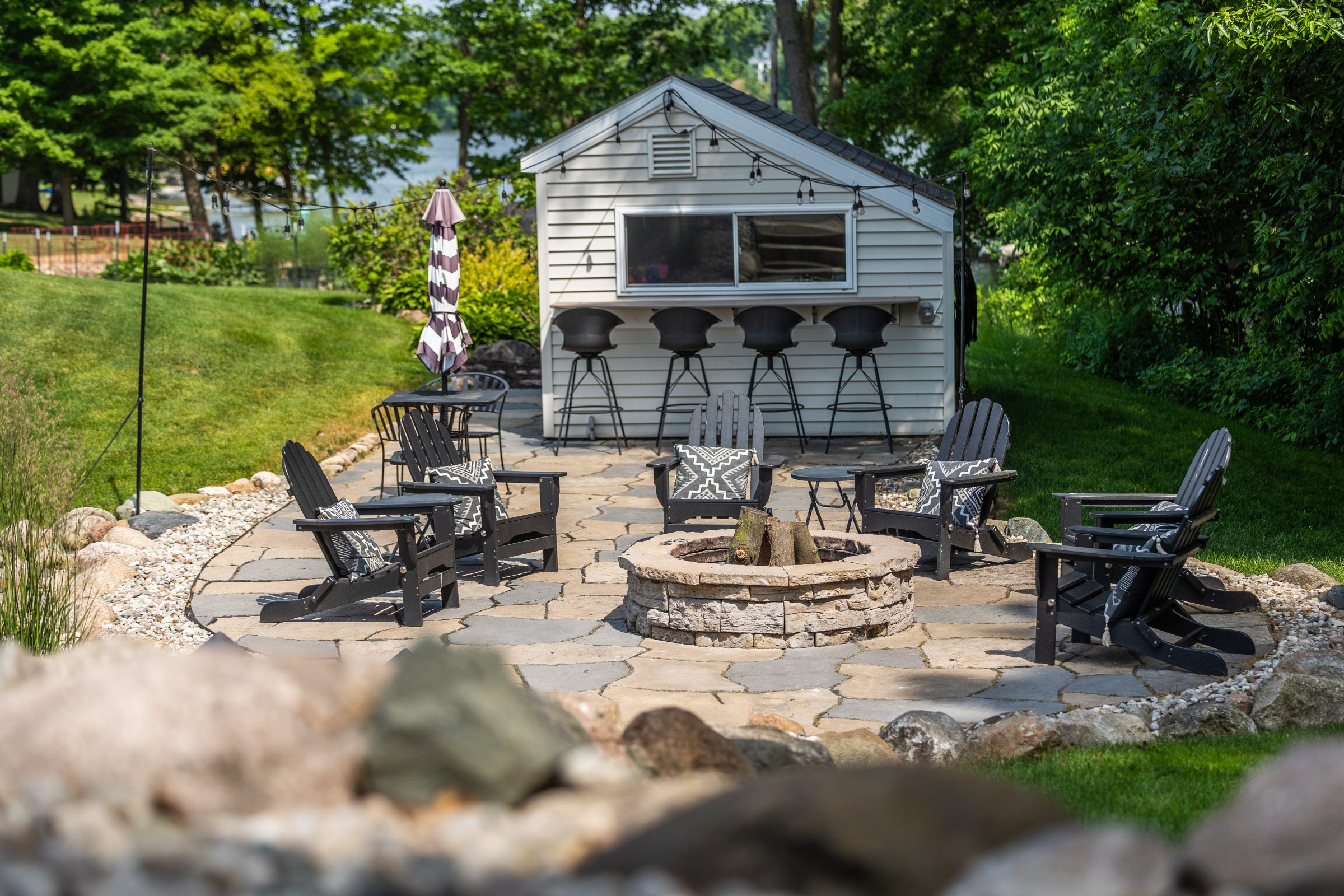 Outdoor patio with fire pit and chairs