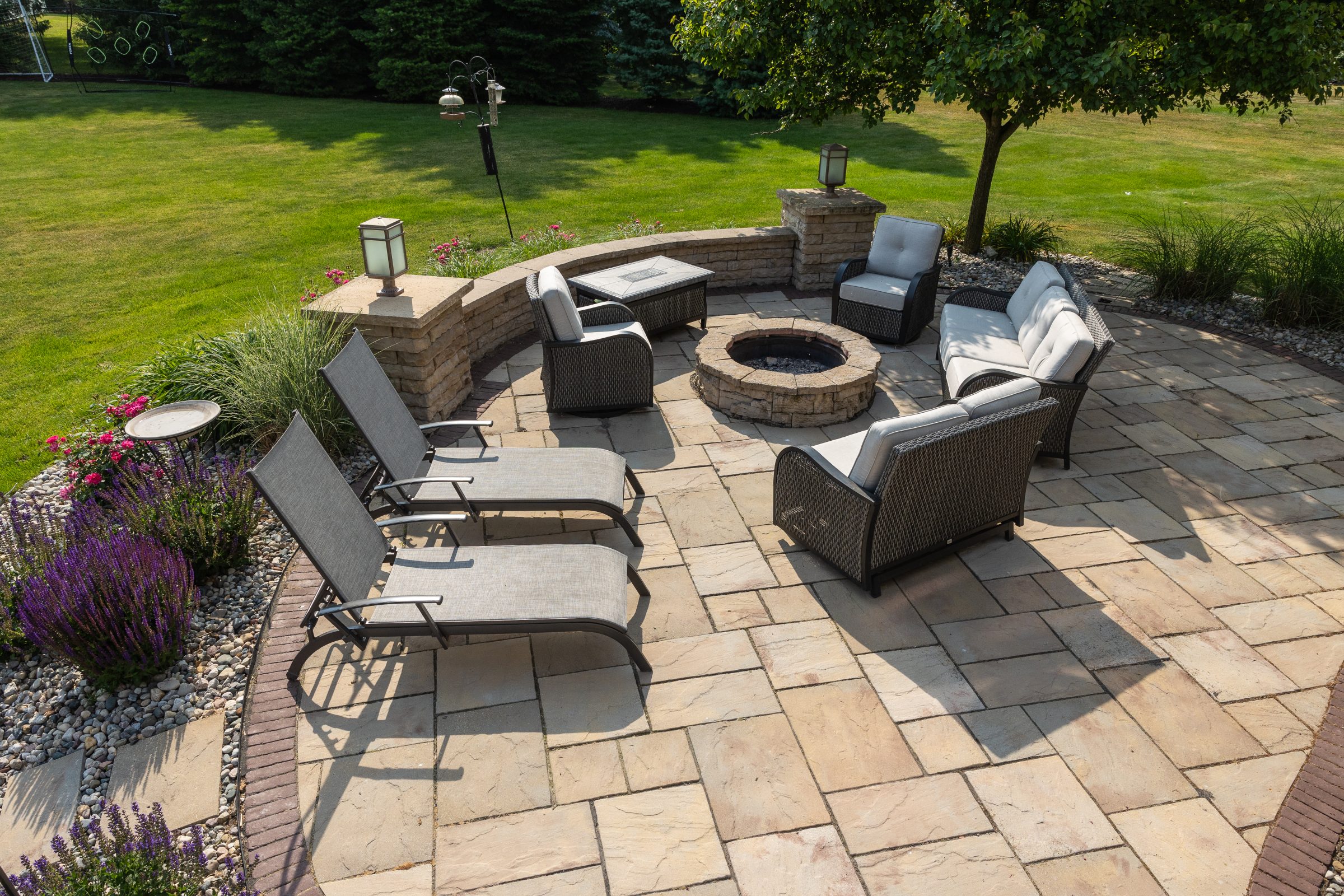 Outdoor patio with furniture and fire pit